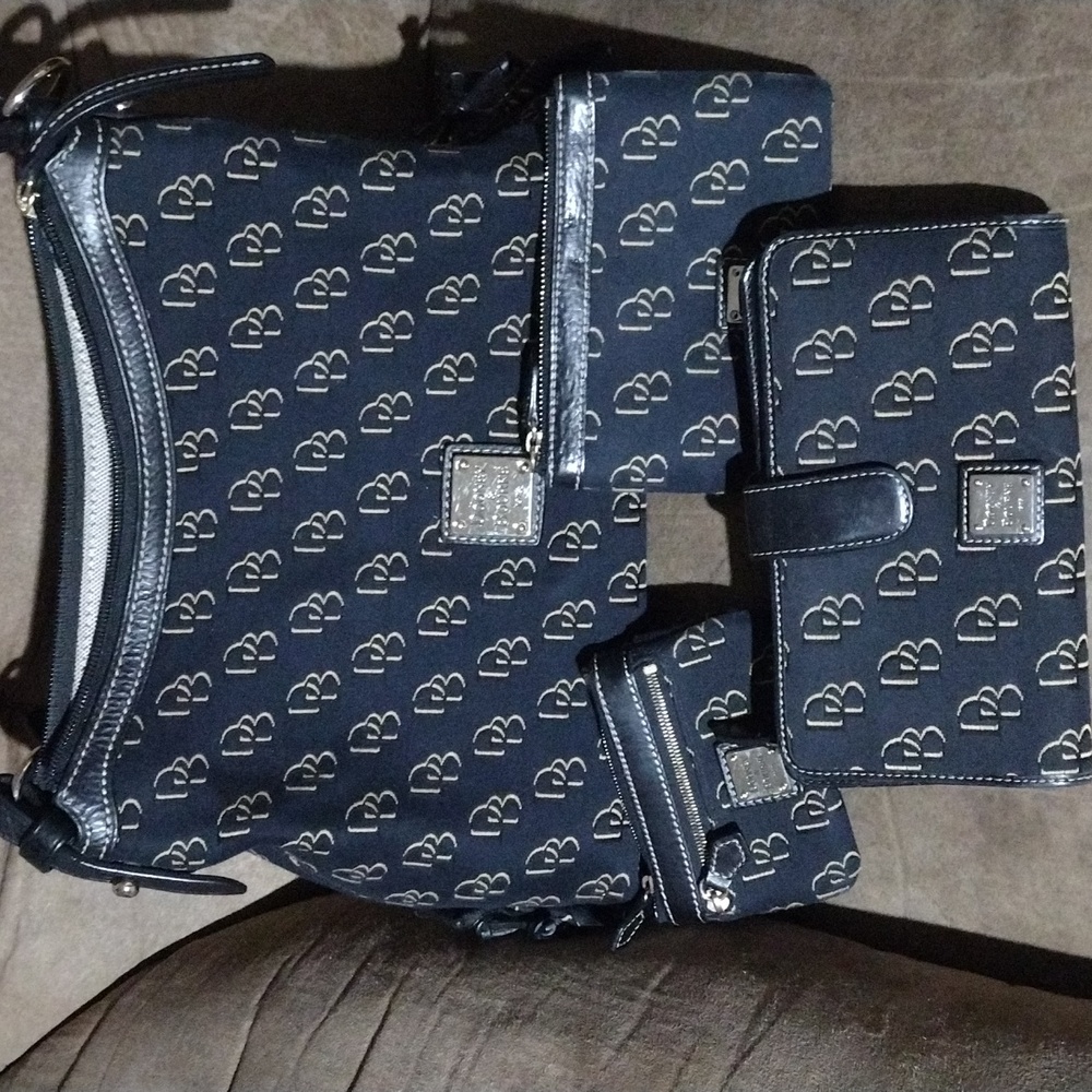 4 piece Dooney and Bourke set